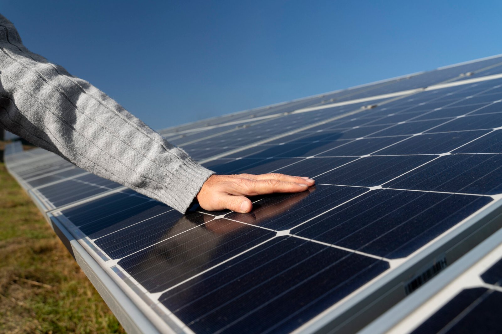 person-near-alternative-energy-plant